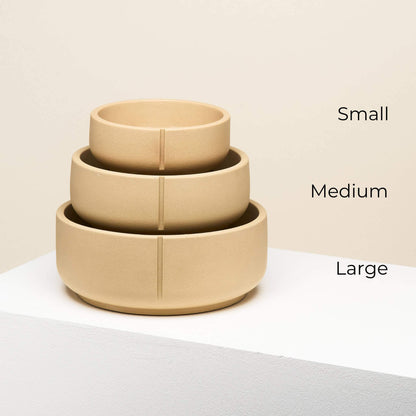 A small, medium and large classic feeder on top of each other