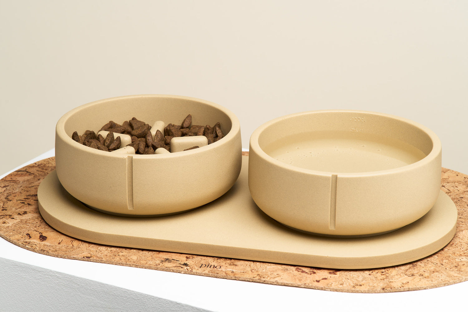 Complete Camel Brown bowl set filled with food and water